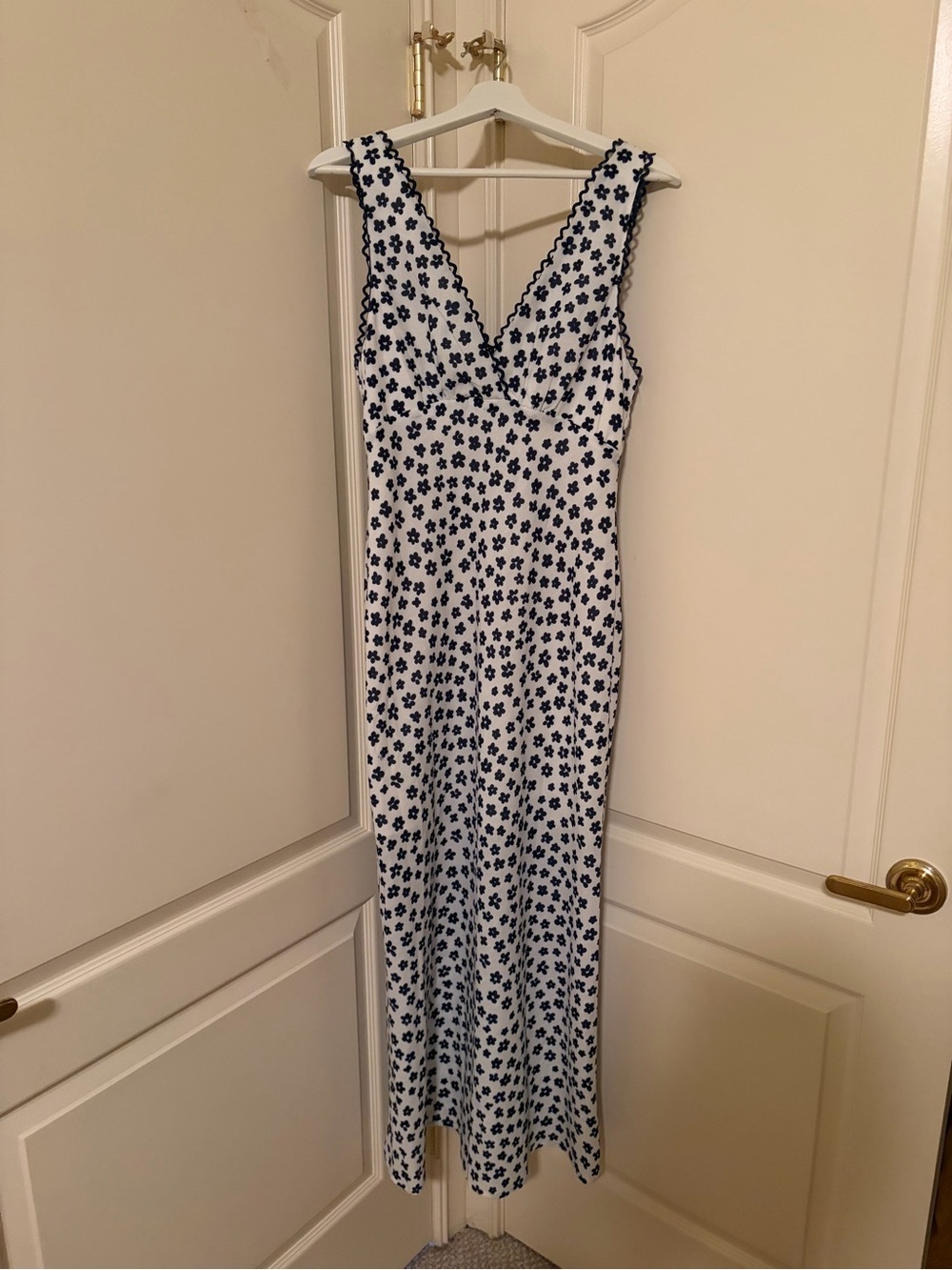 Sleeveless White Maxi Dress with Navy Floral Print